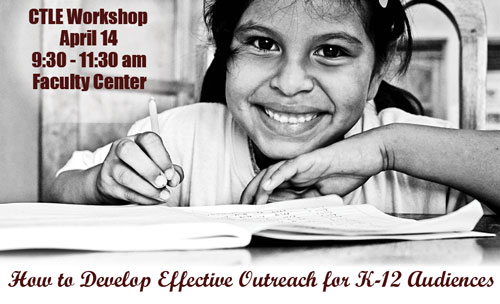 elementary-aged girl writing at desk and smiling